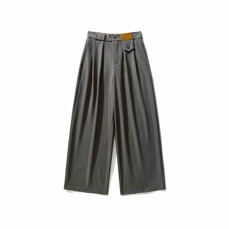Women's wide culotte pants with knife pleats, high waistband, and decorative button detail Mune Fashion