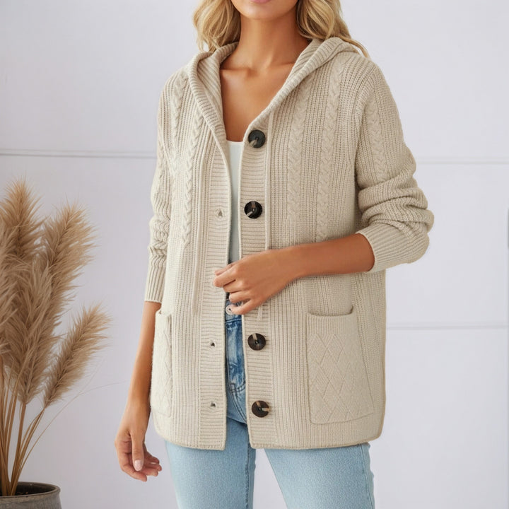 Women's knitted hooded cardigan with ribbed pattern, large wooden buttons, and patch pockets Mune Fashion