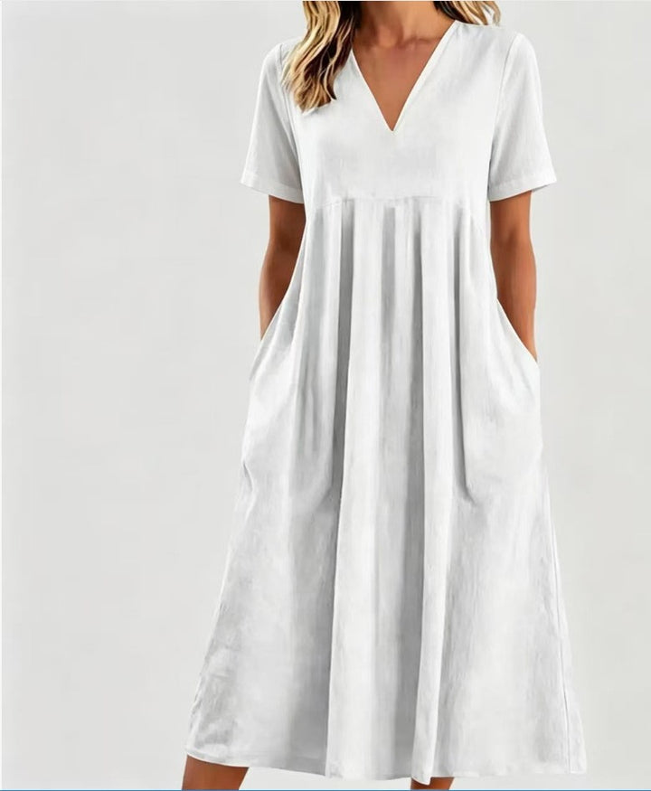 Women nan legeres V-neck midi dress with side pockets and gathered empire seam Mune Fashion