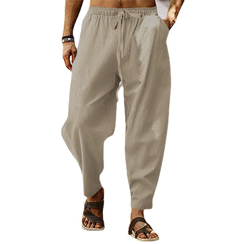 Men's lightweight harem pants in linen look with elastic drawstring waistband, side pockets, and tapered ankle cuffs Mune Fashion