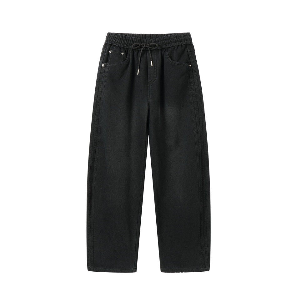 Women's wide high-waisted jeans with elastic waistband, drawstring, and decorative seams Mune Fashion