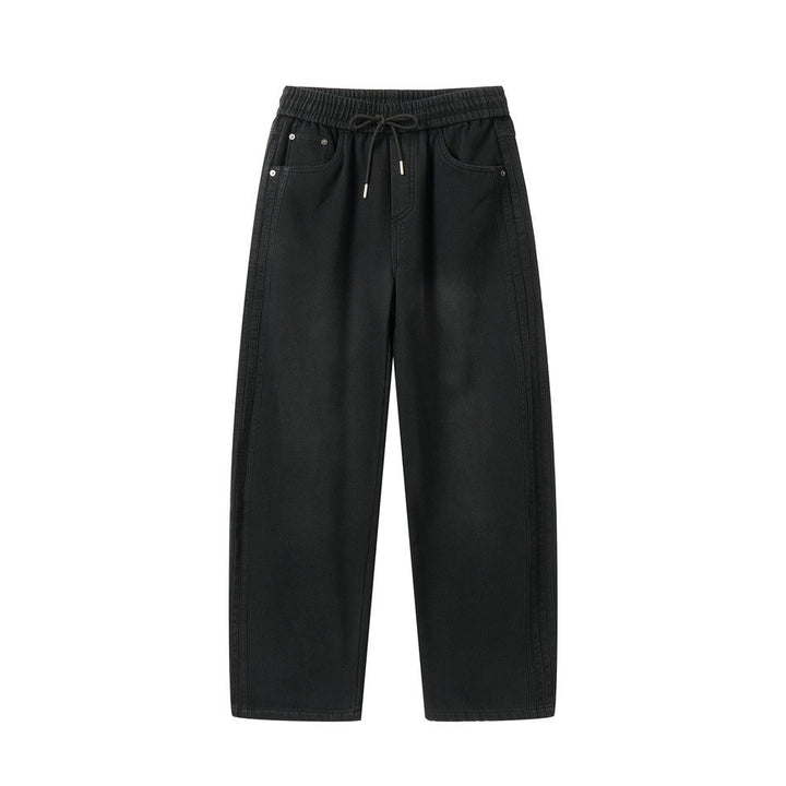 Women's wide high-waisted jeans with elastic waistband, drawstring, and decorative seams Mune Fashion