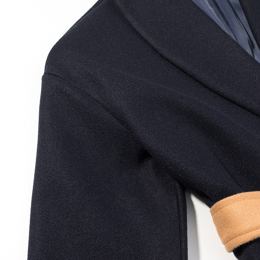 Women's short coat with tie belt, contrast pockets and faux fur cuffs Mune Fashion