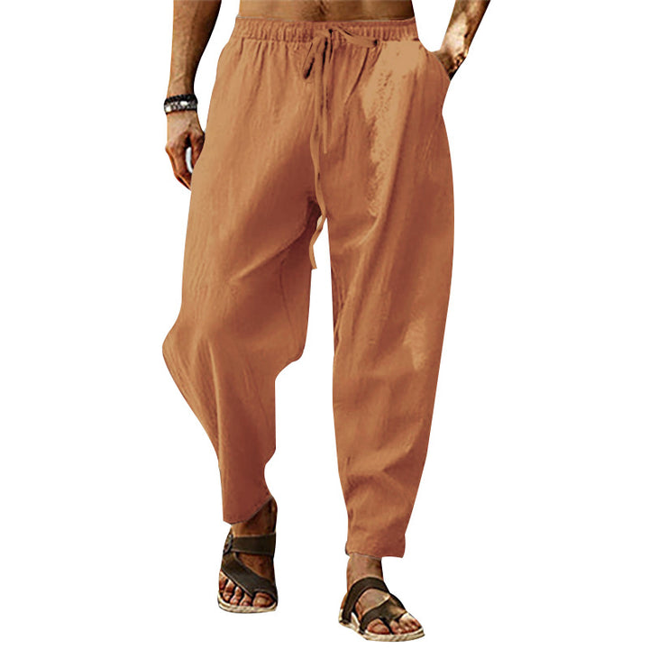 Men's relaxed summer slouch pants made of linen blend with elastic waistband and tapered ankle cuffs Mune Fashion