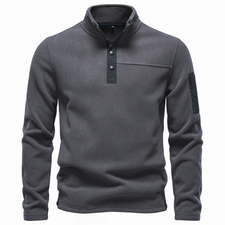 Men's fleece pullover with stand-up collar, snap button placket, and arm pocket Mune Fashion
