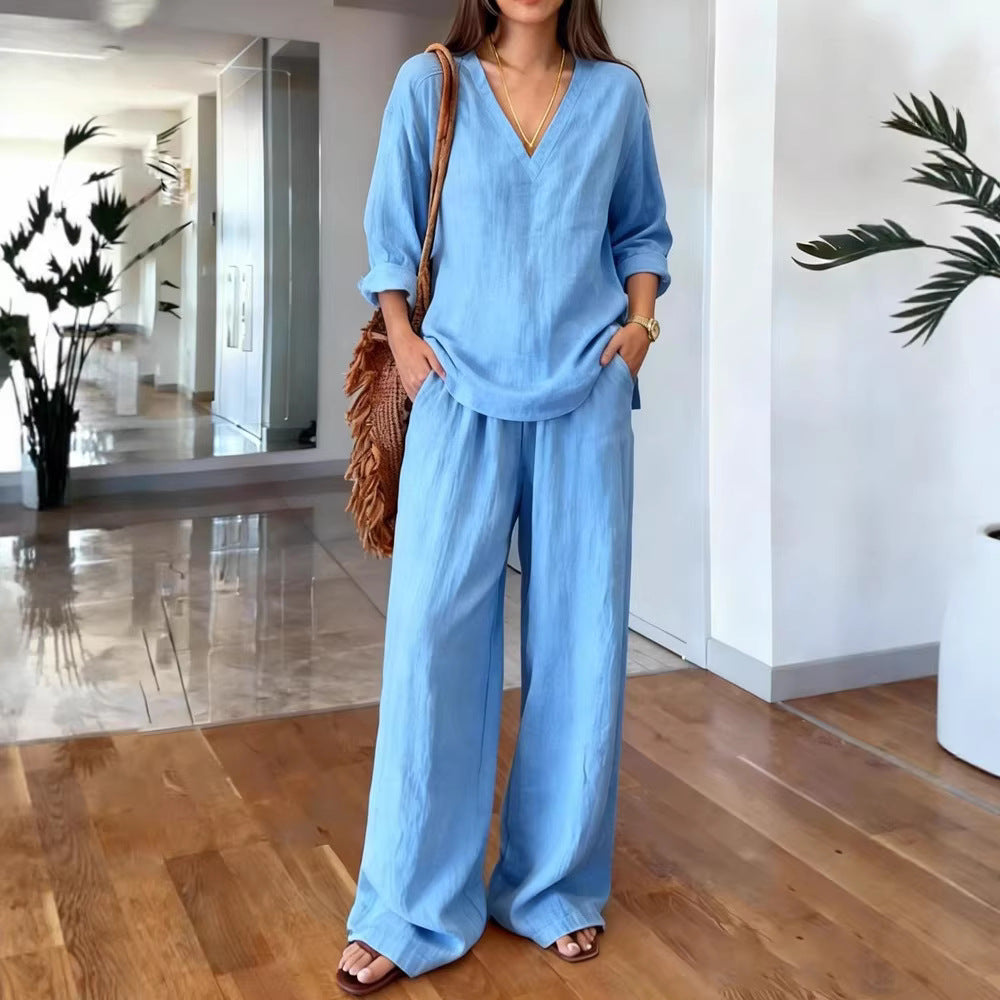 Women's lightweight linen look two-piece set with deep V-neck, loose 3/4 sleeves, and wide palazzo pants cut Mune Fashion