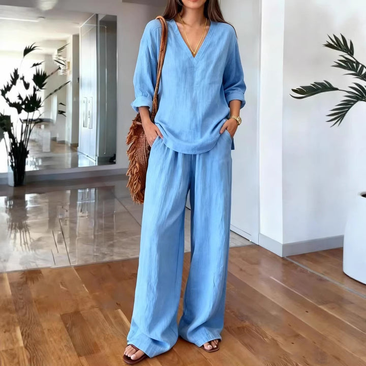 Women's lightweight linen look two-piece set with deep V-neck, loose 3/4 sleeves, and wide palazzo pants cut Mune Fashion