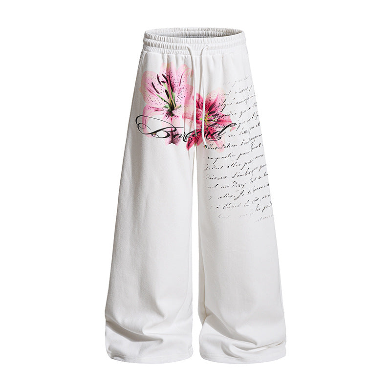 Women’s Wide Palazzo Lounge Pants in Culotte Style with Comfort Waistband, Drawstring and Floral Print Application Mune Fashion