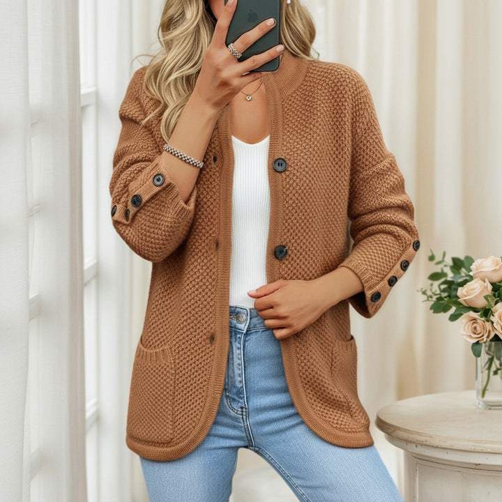 Women's structured oversized cardigan with decorative sleeve button placket and patch pocket Mune Fashion
