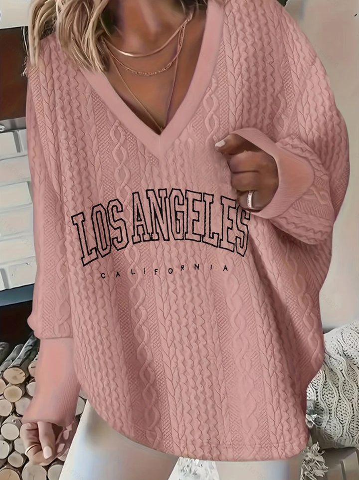 Women's oversized cable knit sweater with V-neck and logo print Mune Fashion