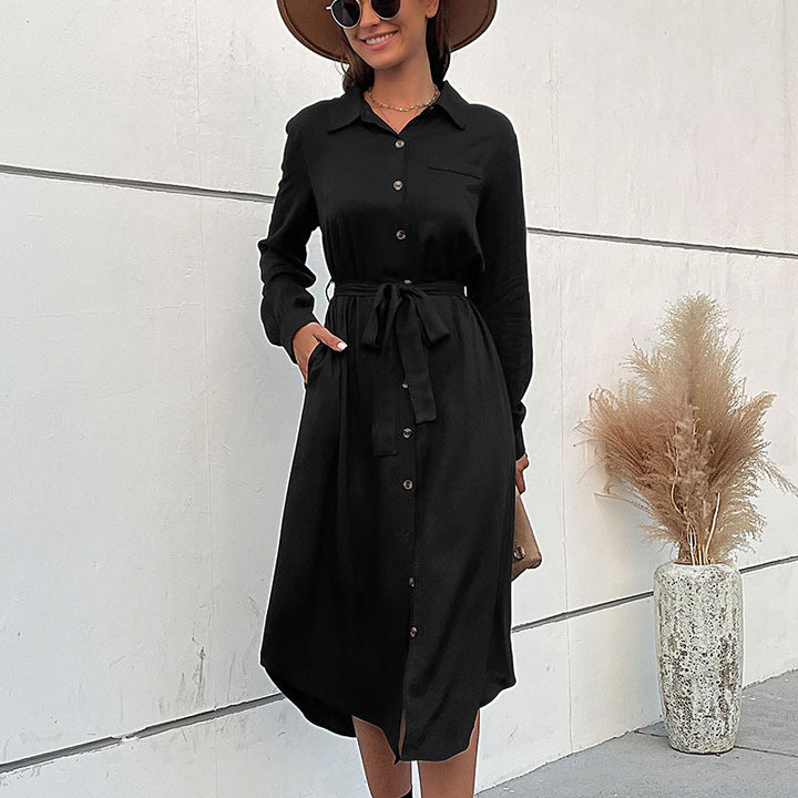 Women’s midi dress in shirt blouse style with continuous button placket, waist tie belt, and long sleeves Mune Fashion