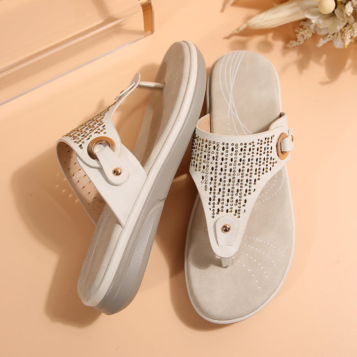 Women's toe-post sandals with viscoelastic comfort footbed, decorative eyelet application, and perforated insole Mune Fashion