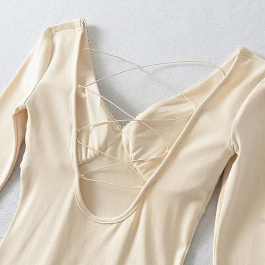 Ladies form-fitting mini dress with a deep V-neckline, gathered bust, and crossed back straps Mune Fashion