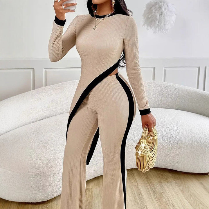Women's elegant ribbed jumpsuit with asymmetrical wrap look, fitted cut-out, and contrasting side stripes Mune Fashion