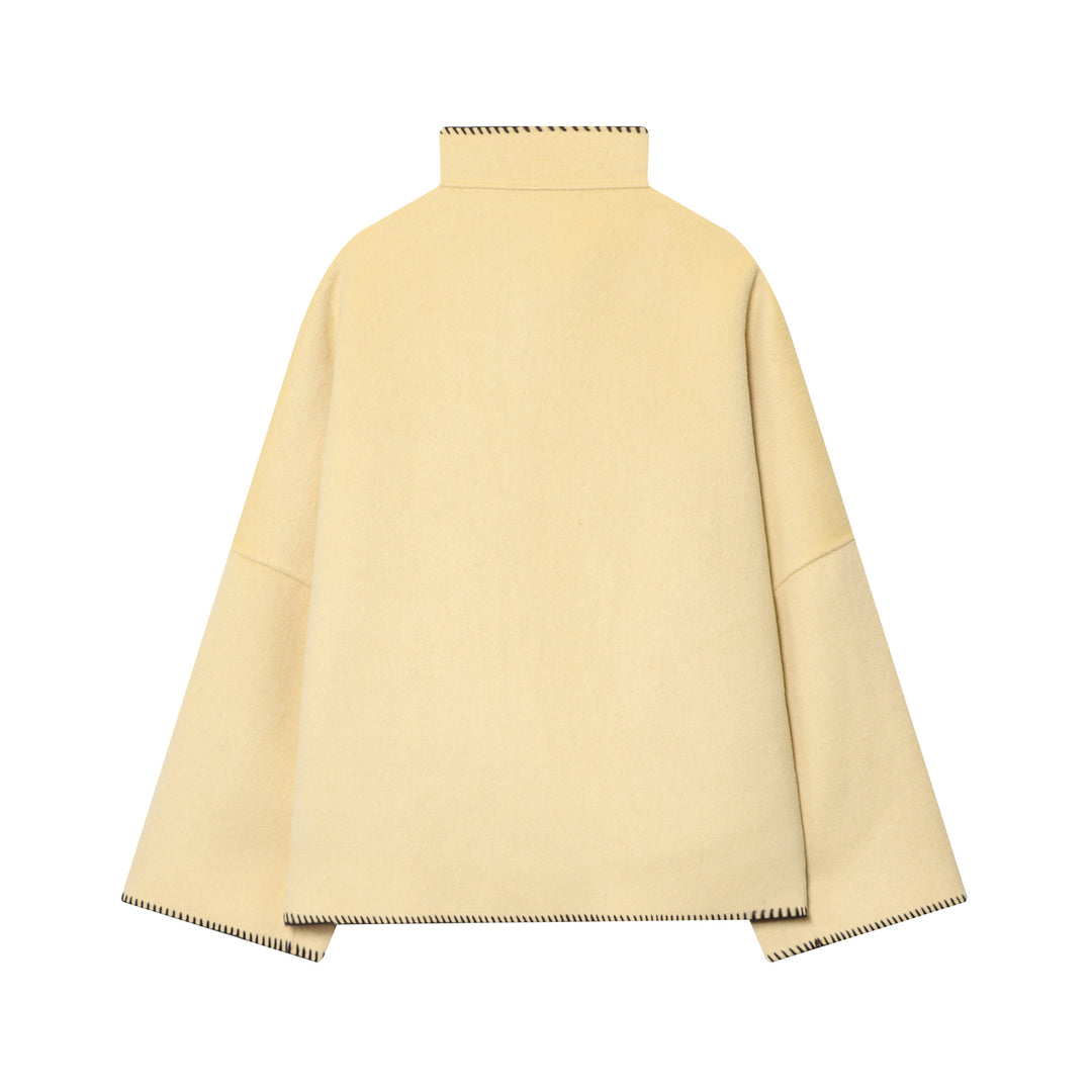 Women's cape coat with stand-up collar, asymmetric button placket and decorative seam Mune Fashion