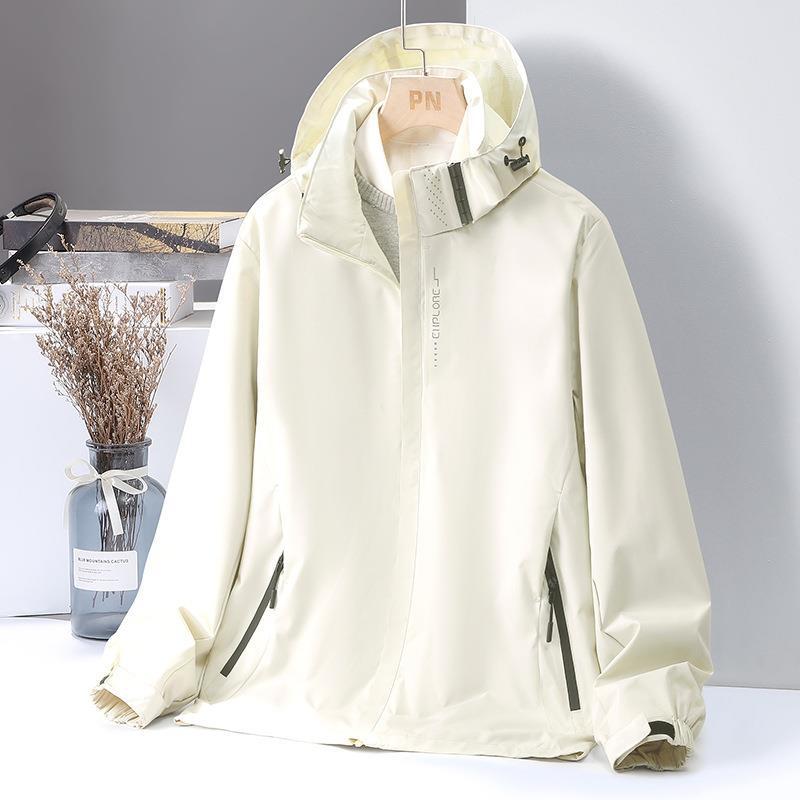 Women's Lightweight Softshell Hooded Jacket with Windproof Storm Flap and Concealed Zipper Pockets Mune Fashion