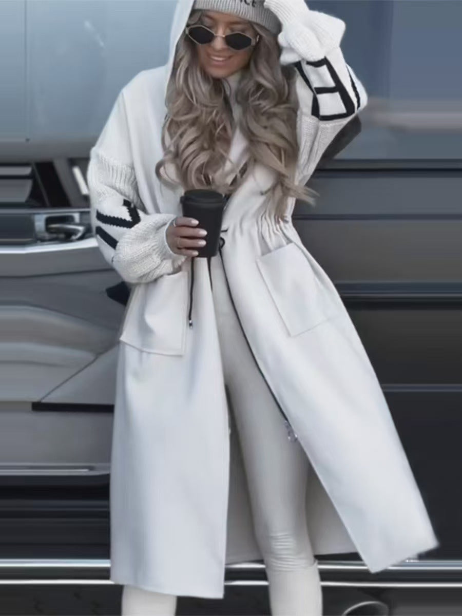 Women’s hooded coat with oversized cut, knitted sleeve cuffs and patch pockets Mune Fashion