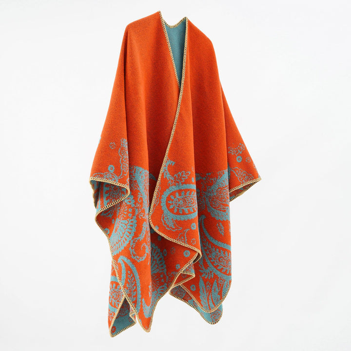 Women's wool blend reversible cape with paisley jacquard and open V-neck Mune Fashion
