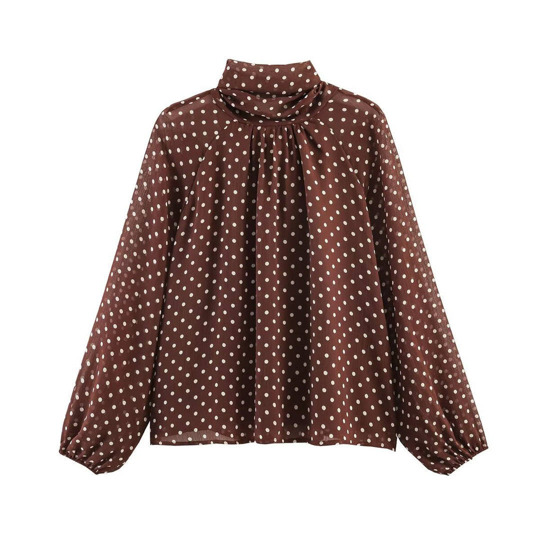 Women's lightweight polka dot blouse with gathered stand collar, frill yoke, and balloon sleeves Mune Fashion