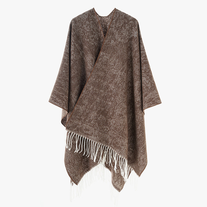 Women's poncho made of wool blend knit with fringes and wide oversized cut Mune Fashion