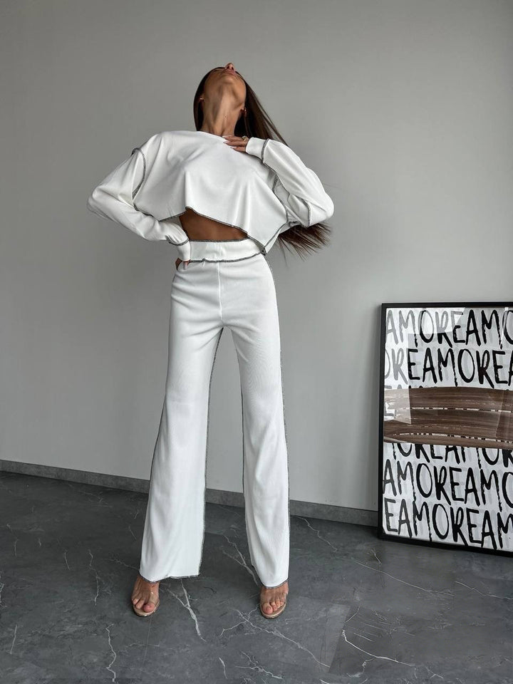 Women Cropped Oversized Sweatshirt with Overlock Seams and High-Waist Flared Pants Set Mune Fashion