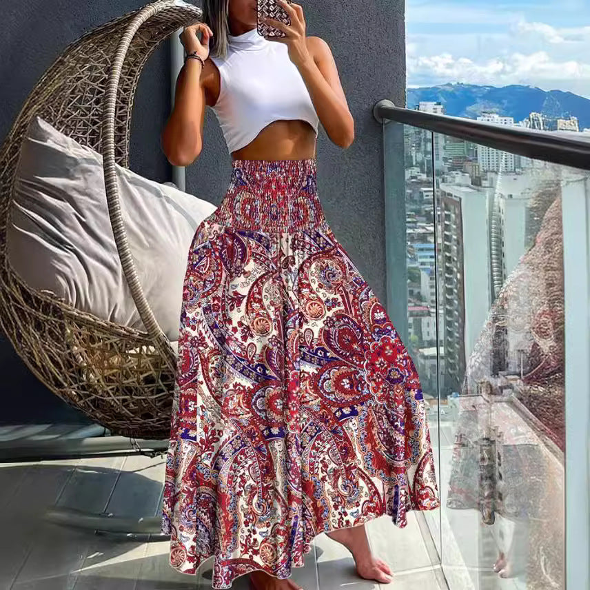 Ladies nan maxi skirt with high smocked waist and flowing boho pleated look Mune Fashion