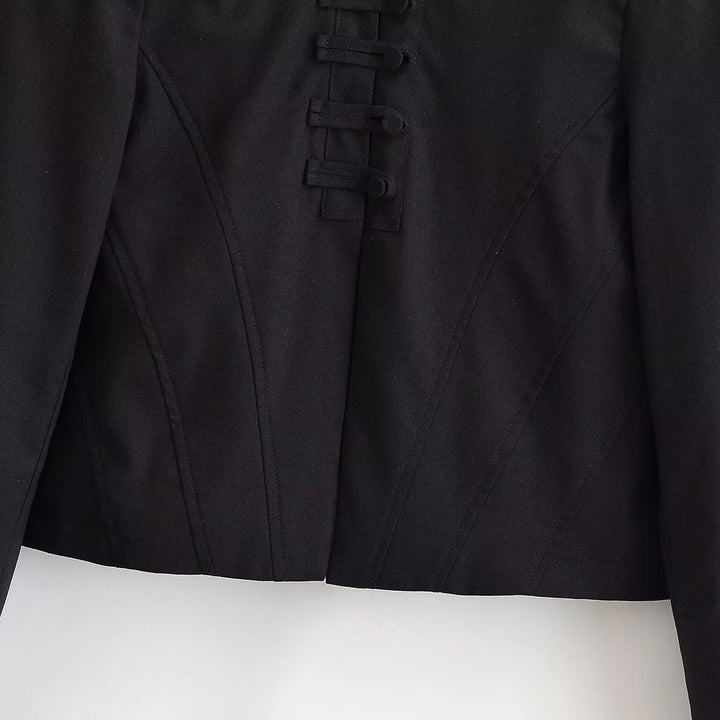 Women short fitted jacket with stand-up collar and decorative loop tape Mune Fashion