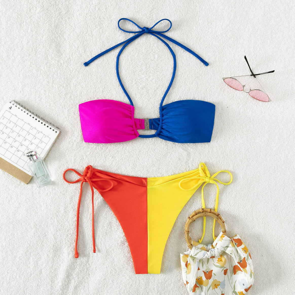Women's triangle bikini with adjustable side straps and innovative cut Mune Fashion