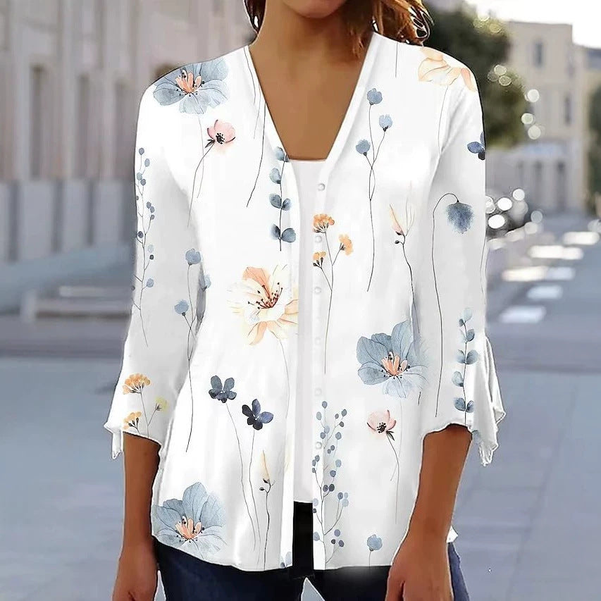 Women's light chiffon blouse with watercolor flower print, V-neck, button placket and three-quarter sleeves Mune Fashion