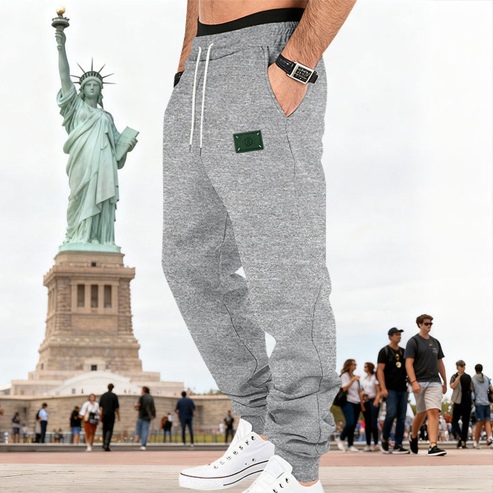 Men's Slim-Fit Sweat Jogger with elastic waistband, drawstring, and ribbed cuffs