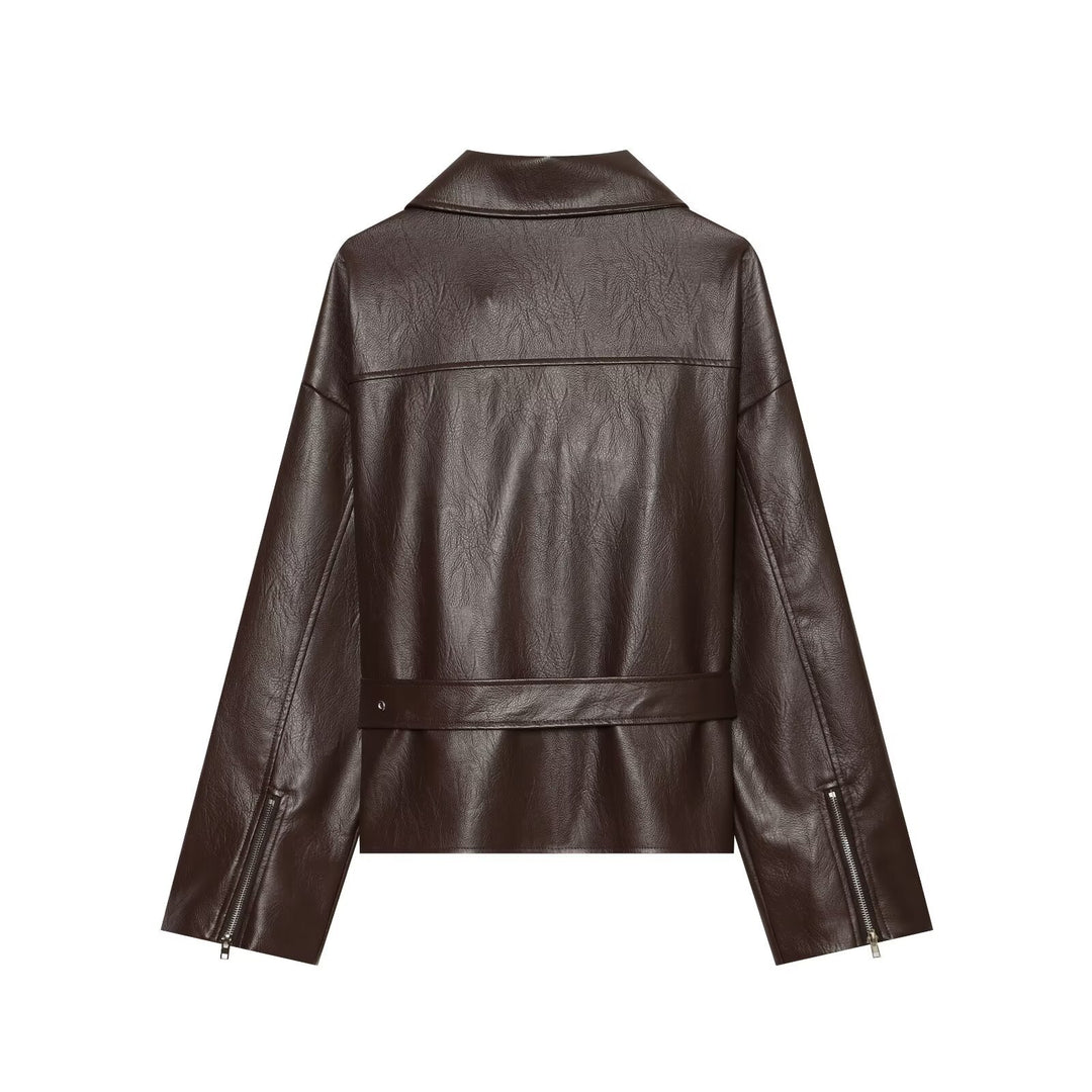 Women's oversized biker jacket made of synthetic leather with a fitted belt and asymmetrical zipper Mune Fashion