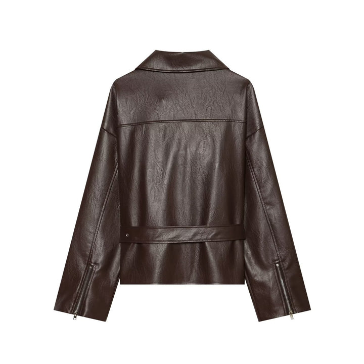 Women's oversized biker jacket made of synthetic leather with a fitted belt and asymmetrical zipper Mune Fashion