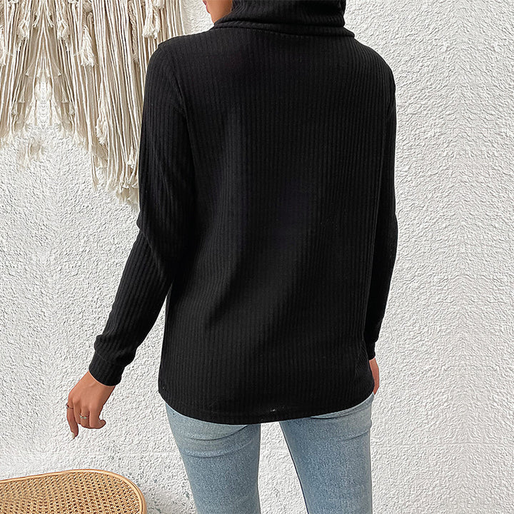 Women's ribbed turtleneck sweater with asymmetric button placket and tailored silhouette Mune Fashion