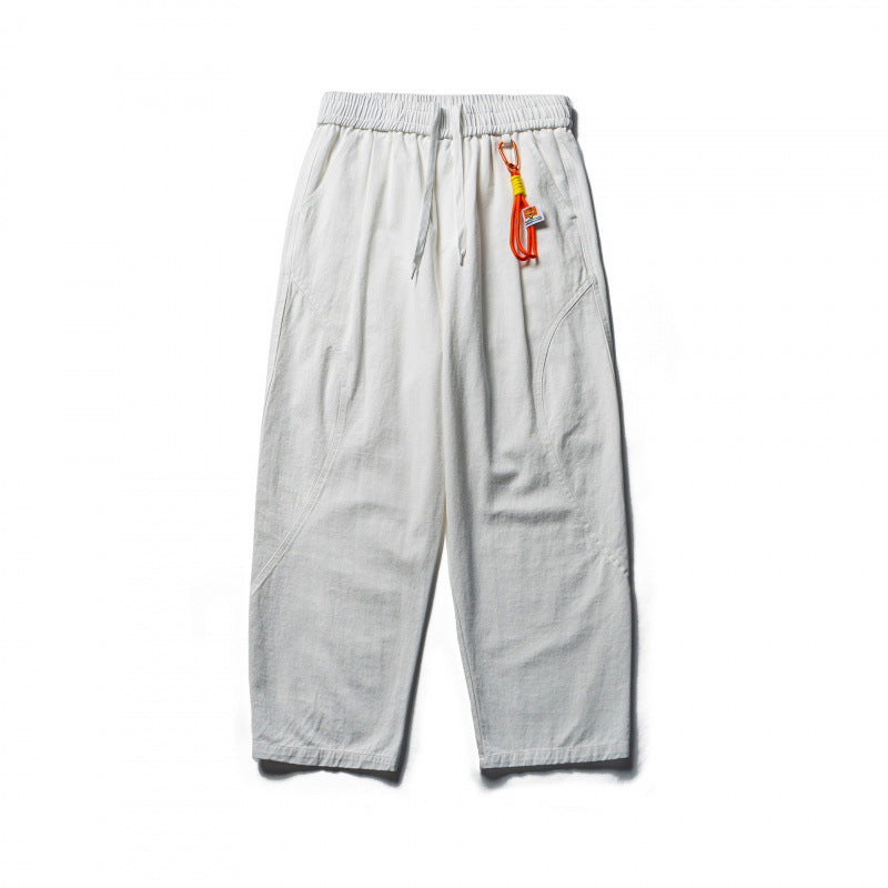 Unisex locker cut cropped leisure pants with elastic waistband, drawstring, and carabiner detail Mune Fashion