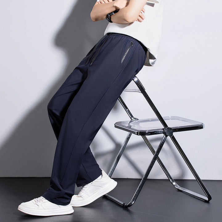 Men's sporty training pants with elastic waistband and practical pockets Mune Fashion
