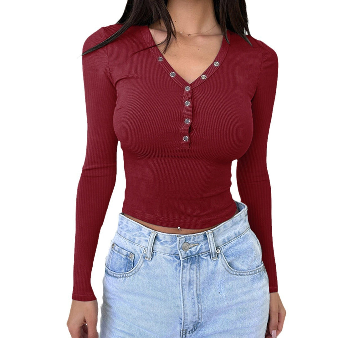 Women's fitted ribbed long sleeve shirt with decorative button placket and metal eyelets Mune Fashion