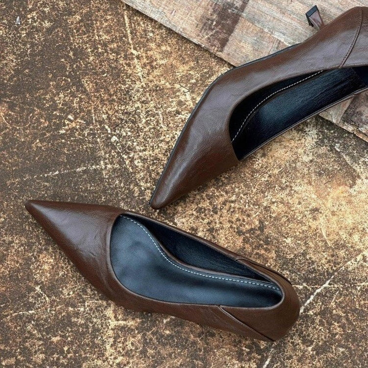 Women's minimalist pointed toe leather look pumps with ergonomic low heel Mune Fashion