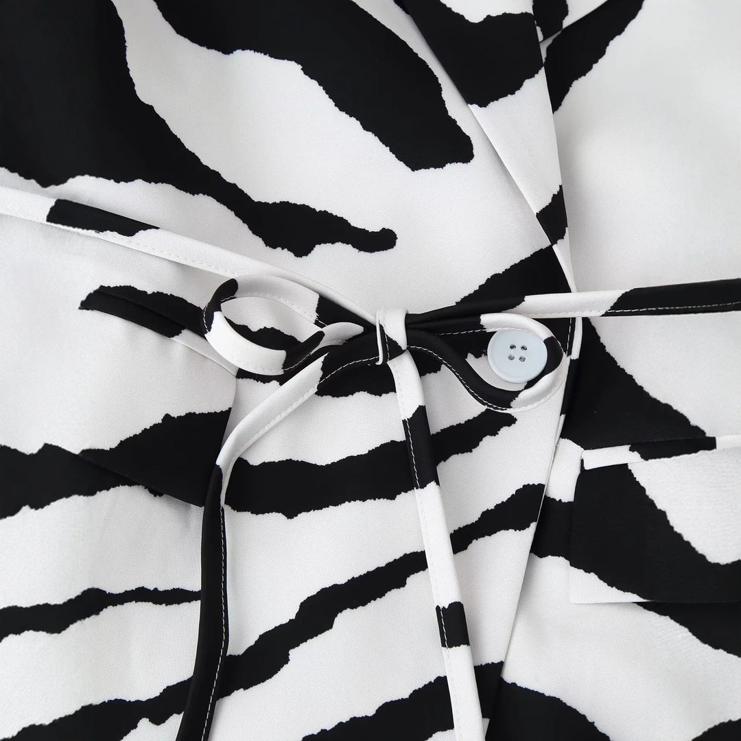 Women’s Blazer with Zebra Print, tailored tie belt and cut-out shoulders Mune Fashion