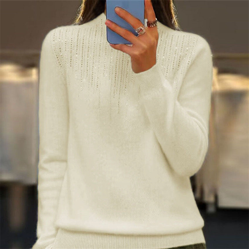 Women's cozy fine knit sweater with subtle rhinestone embellishment at the round neckline and ribbed hem Mune Fashion