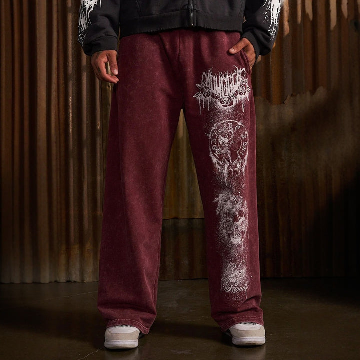 Men's baggy joggers with elastic waistband, side pockets and detailed skull and rose motif Mune Fashion