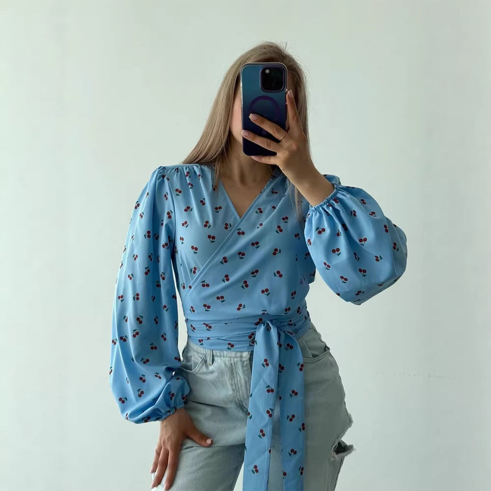Women's wrap blouse with cherry print, wide puff sleeves & tie belt Mune Fashion
