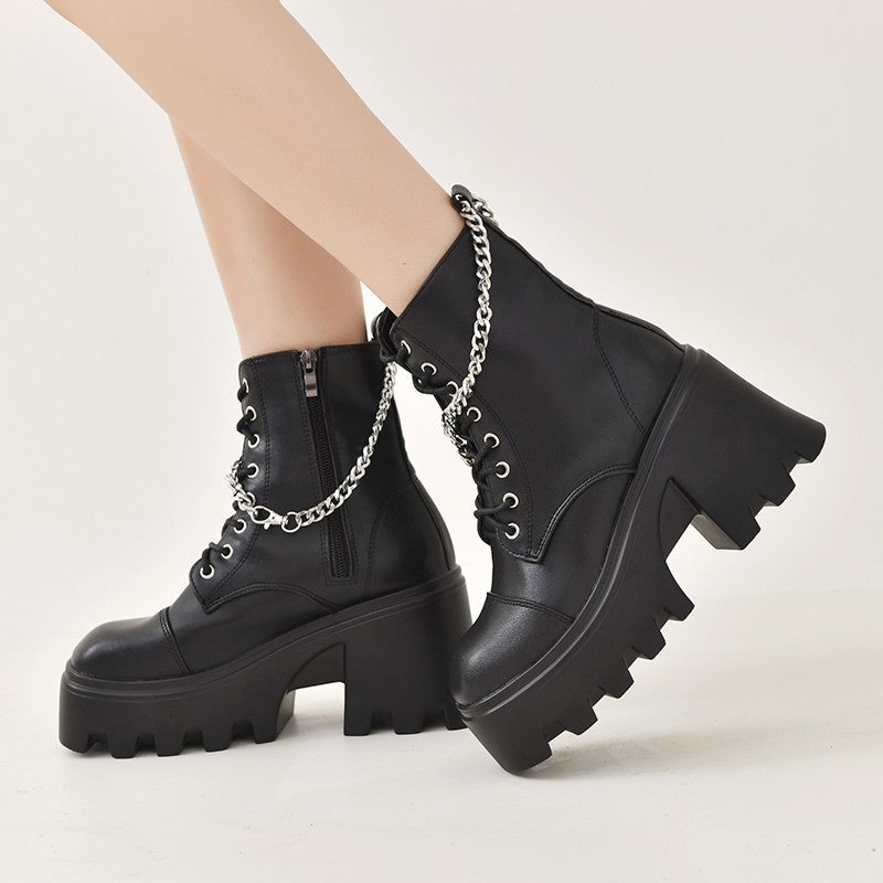 Ladies high-cut platform biker ankle boots in patent look with lacing, side zipper, and decorative buckle and stud application Mune Fashion