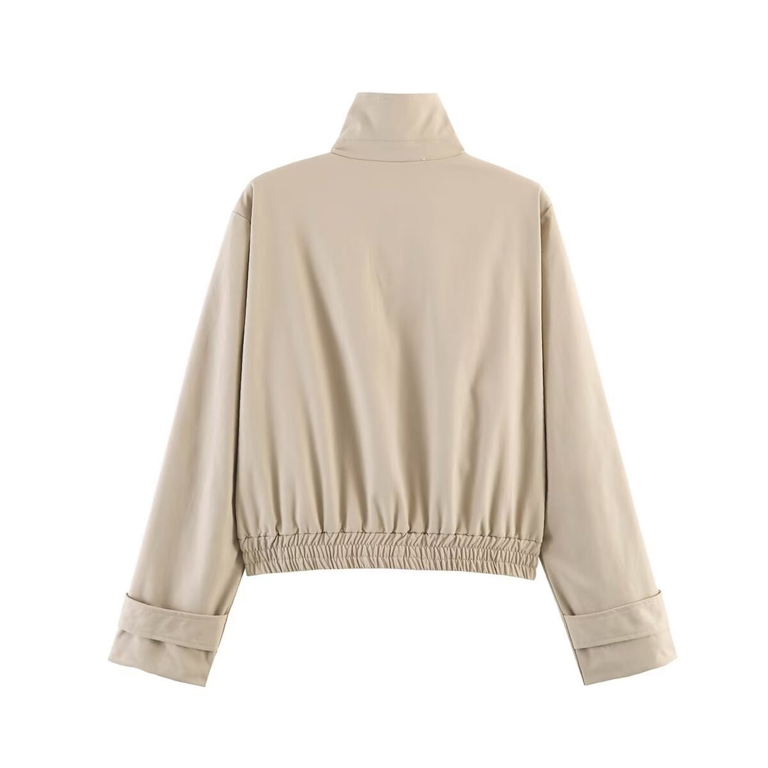Women’s short-cut minimalist blouson jacket made of soft vegan leather with a lapel collar and elastic hem Mune Fashion