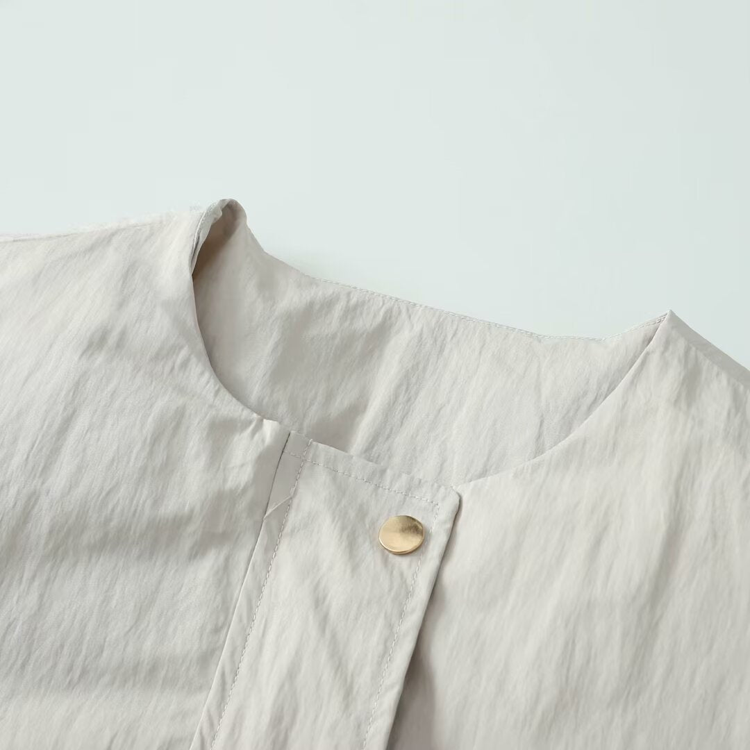 Women's lightweight utility blouson jacket with round neckline, snap button placket and large patch pockets Mune Fashion