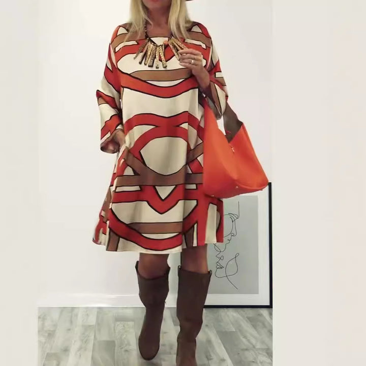Women's generous swing dress with wide tulip hem, batwing sleeves and graphic all-over pattern Mune Fashion