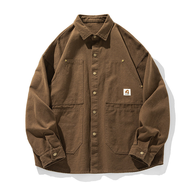 Unisex overshirt in workwear style with snap button placket and four patch pockets Mune Fashion