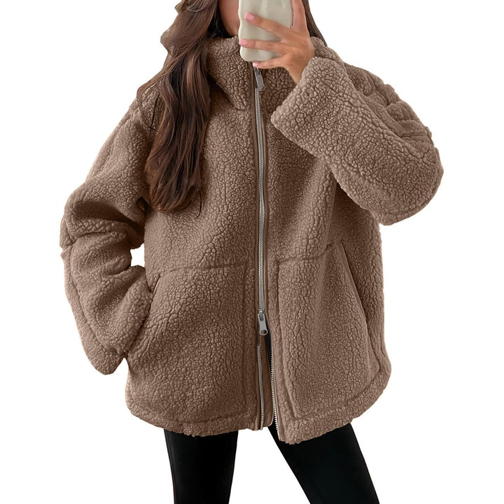 Women's oversized teddy fur jacket with stand-up collar, zipper, and patch pockets Mune Fashion