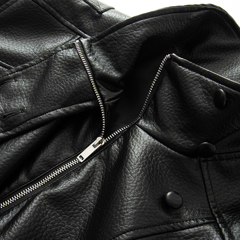 Women's nano asymmetric oversized faux leather jacket with stand-up collar, shoulder epaulettes and drawstring hem Mune Fashion