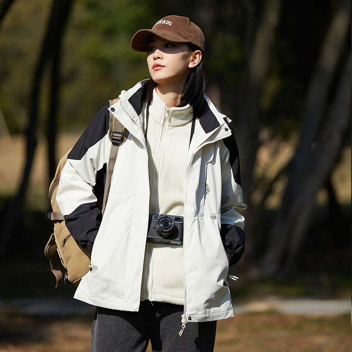 Women two-layer water-repellent outdoor jacket with hood, waist adjustment and contrast piping Mune Fashion