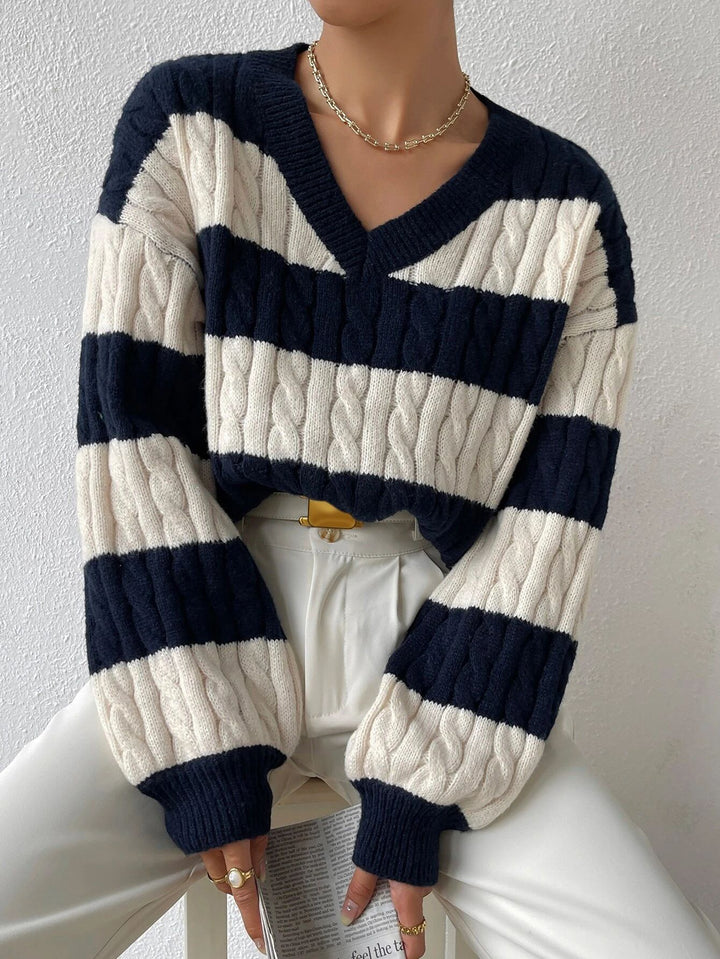 Women's striped chunky knit sweater with cable pattern, deep V-neck and oversized fit Mune Fashion